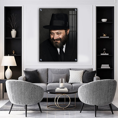 תמונה של הרבי מלובביץ' מחייך בצעירותו