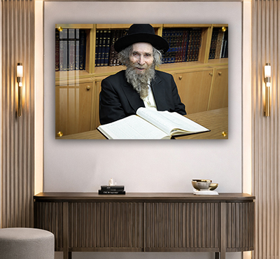 תמונה של הרב אהרן יהודה לייב שטיינמן מחייך